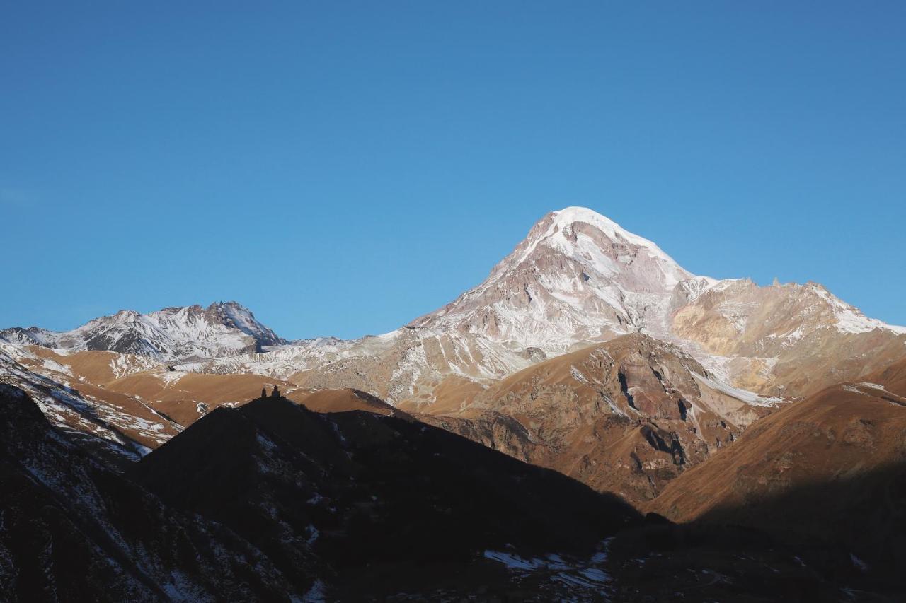 Rooms Hotel Kazbegi Exterior photo The highest peak of the Caucasus, Mount Elbrus, is located in the Caucasus Mountains.